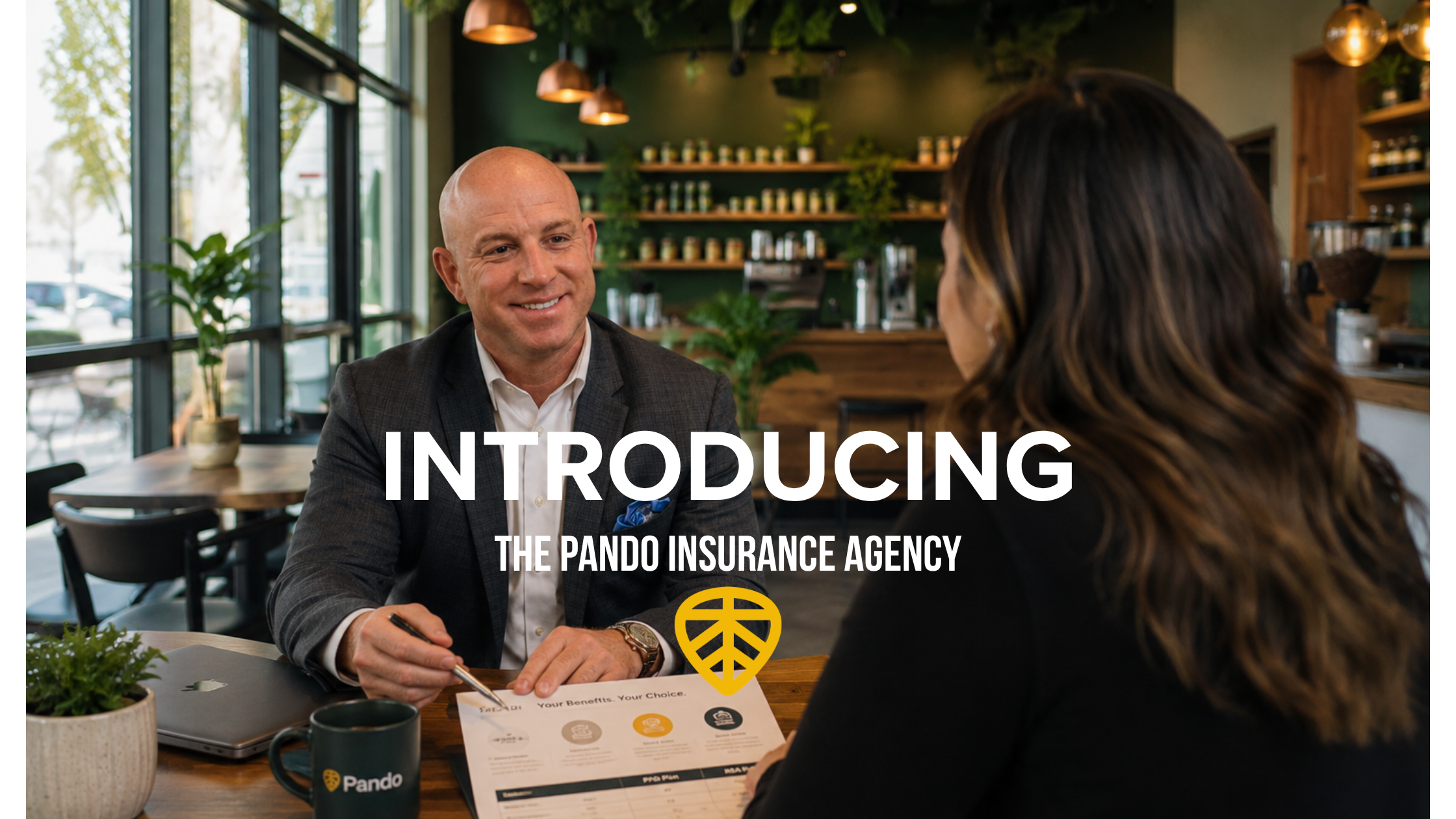 Photo reads "Introducing the Pando Insurance Agency" with Agency Director Mike Pietro talking to a client.